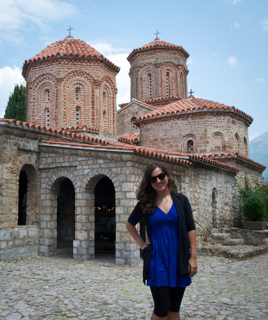 Kate poses at the church in Sveti Naum, North Macedonia