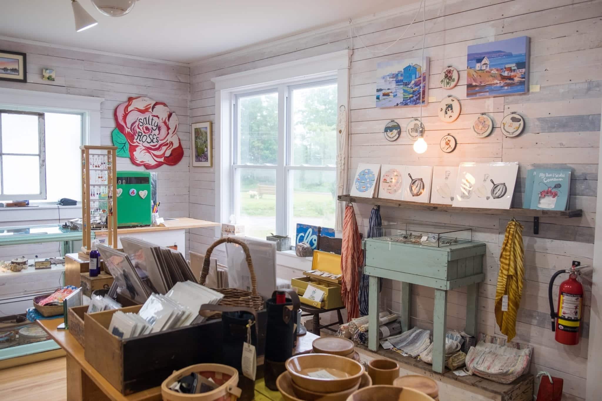 A light-filled room filled with local prints and jewelry in Cape Breton.