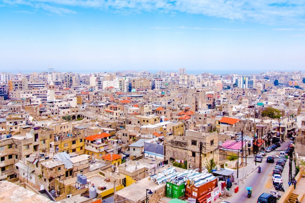 The cityscape of Tripoli: endless rows of rectangular houses, some quite basic cement, leading all the way to the sea.